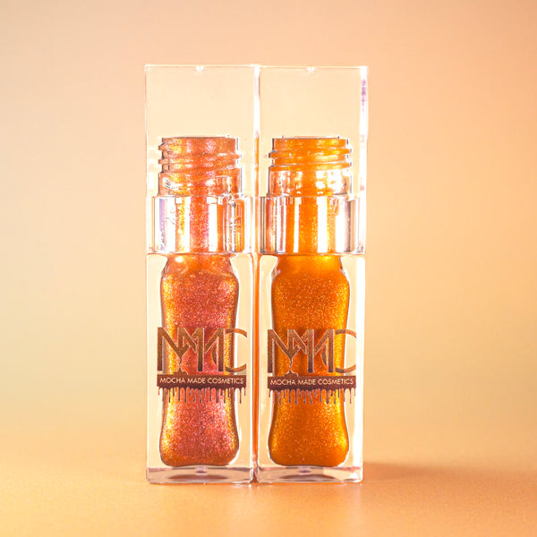 Leo AF is a Golden bronze shimmering sheer lipgloss and Libra Vibes is a pinky orange sheer shimmering lipgloss