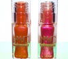 Leo AF is  a Golden bronze shimmering sheer lipgloss and Libra Vibes is a pinky orange sheer shimmering lipgloss