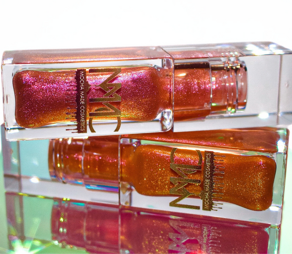 Leo AF is  a Golden bronze shimmering sheer lipgloss and Libra Vibes is a pinky orange sheer shimmering lipgloss