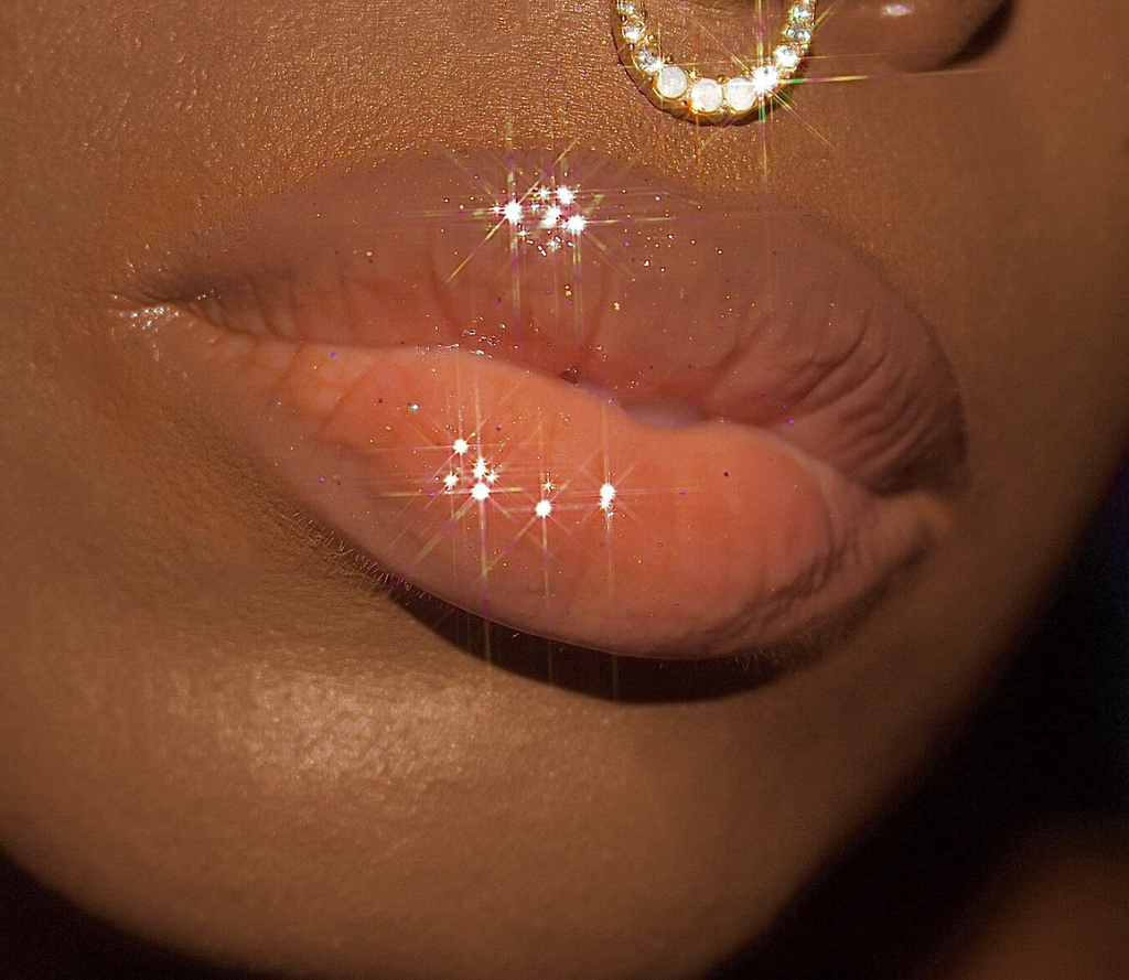 Coco Honey Dew sheer nude lipgloss with flecks of purple and gold glitter decadently juicy moisturizing non sticky universal sheer nude lipgloss nude lip gloss aesthetic nude lip gloss nude lip gloss for black women nude lipgloss swatches nude lipgloss names nude lipgloss for dark skin best lip gloss laesthetic clear lip gloss on lips clear lips clear lip gloss look pat McGrath lust gloss colourpop so glassy lip gloss anastasia beverly hills moon jelly