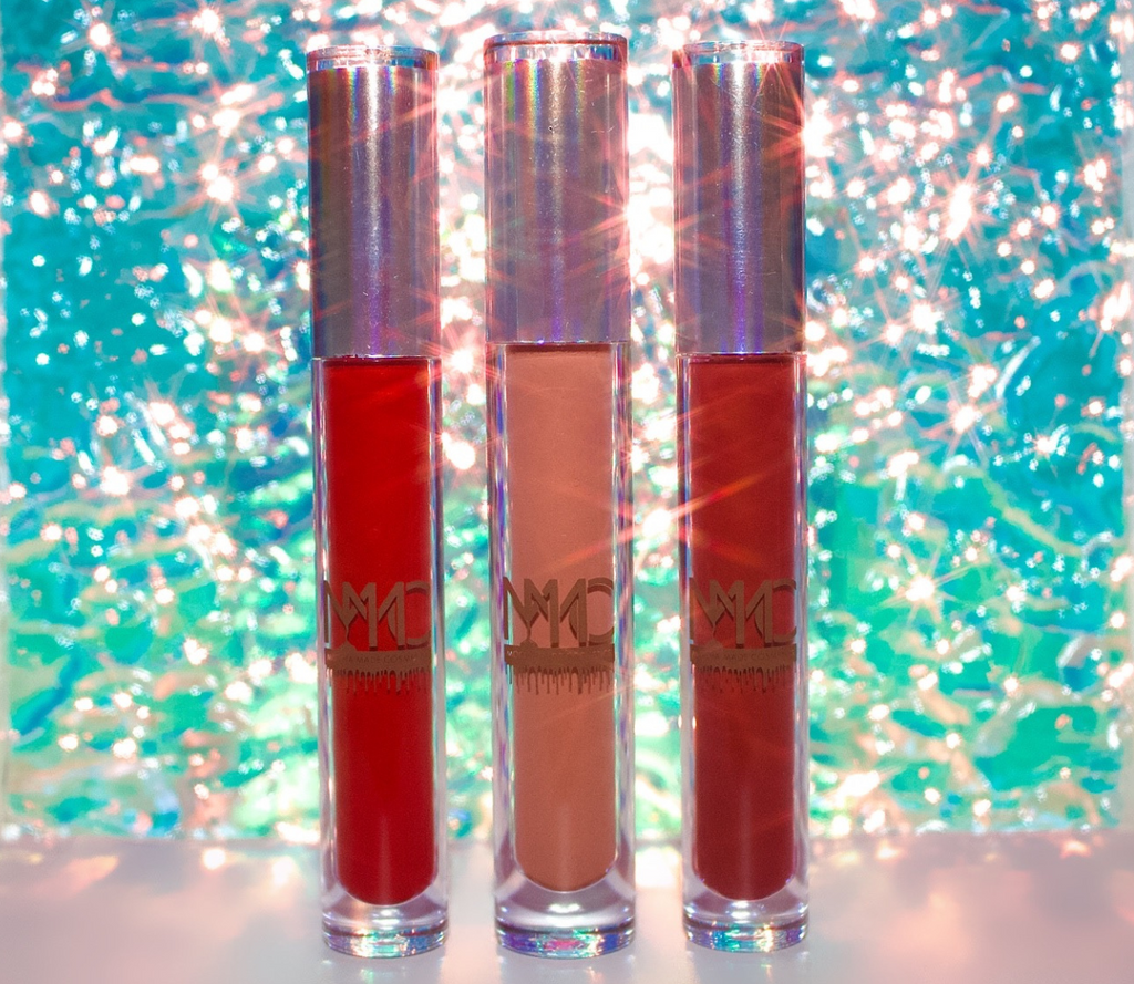 This lip bundle consists of a blue tone cherry red a cool cranberry burgundy and a nude mocha liquid lipstick non transfer velvety smooth smudge proof