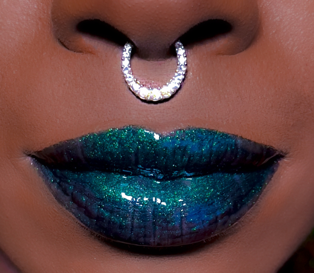 Seeing Green lip gloss is a glittering deep emerald sparkling green that will knock your socks off