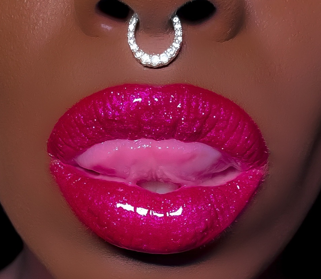 Red Velvet a velvety matte neutral liquid lipstick and Party Gal a glimmering holographic fuchsia pink is the polar opposite duo that you never knew you needed Party Gal on top of Red Velvet creates a glittering holographic Candy Apple Combo