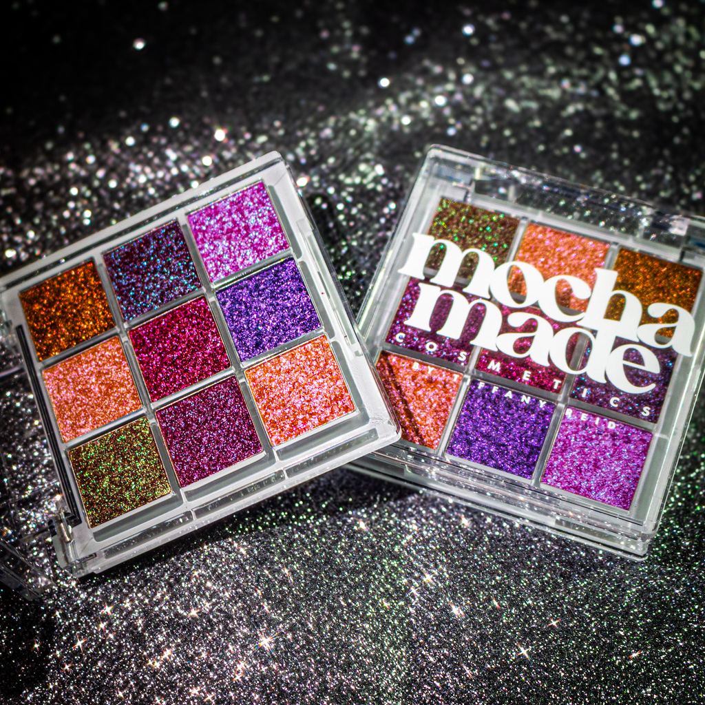 Multi chrome makeup eyeshadow palettes with glittery finish on a sparkling background
