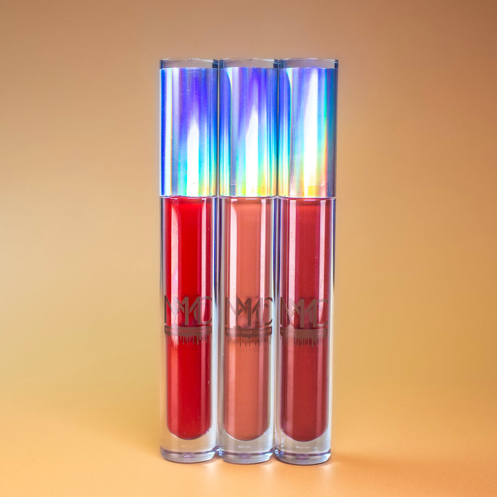 This lip bundle consists of a blue tone cherry red a cool cranberry burgundy and a nude mocha liquid lipstick non transfer velvety smooth smudge proof