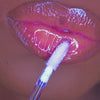 Luna is a sheer purple lip gloss with blue ethereal sparkles