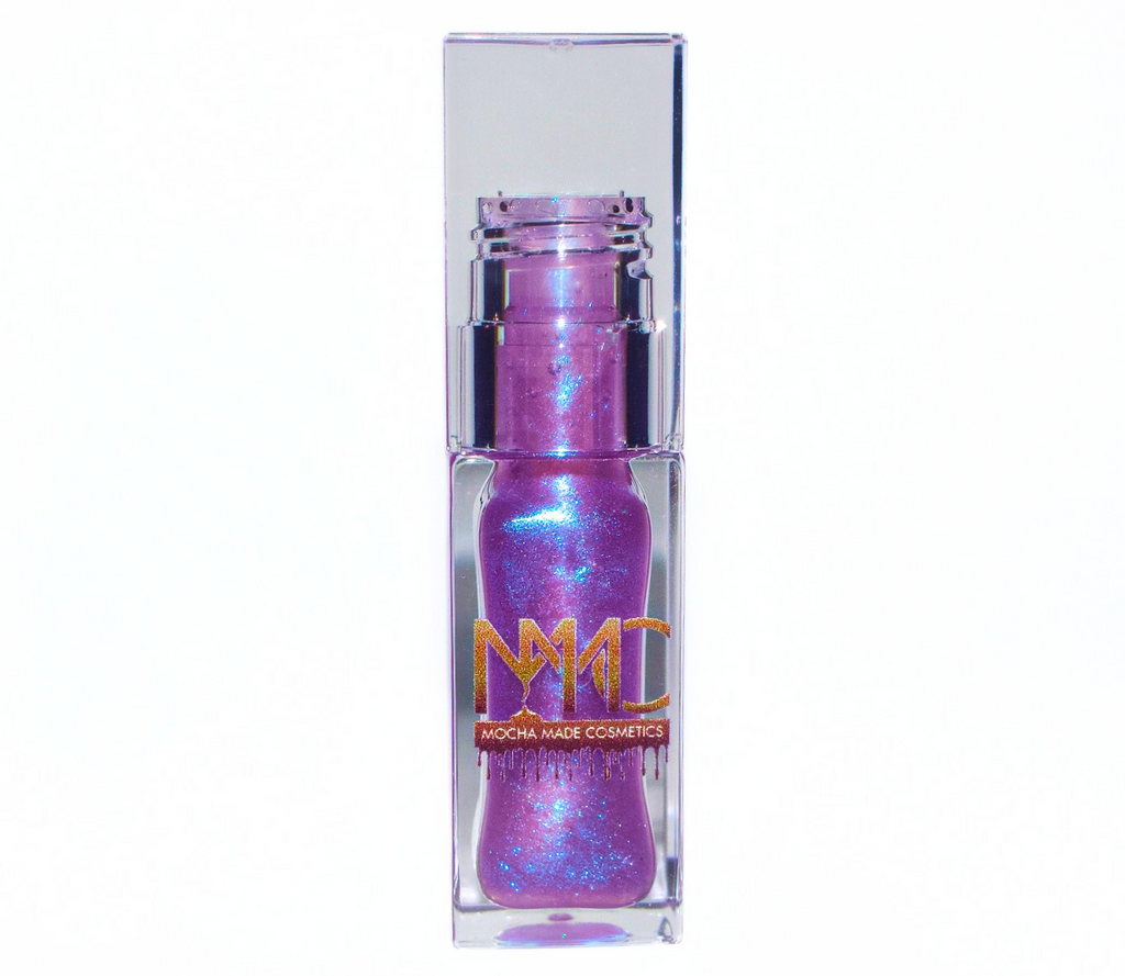 Luna is a sheer purple lip gloss with blue ethereal sparkles