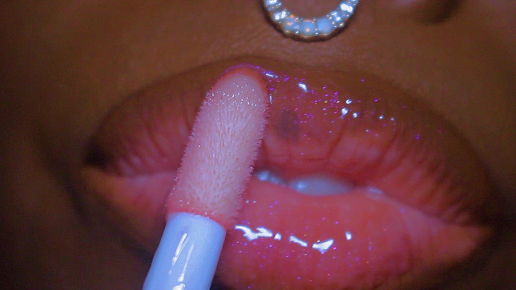  Pink me Nude is an opaque pinky nude gloss with a pinkish gold shimmer undertone Baby Girl  is a super high pink ethereal gloss with a pink purple holographic color shift that transfers as a gorgeous shimmery sheer light pink Part of our Fall Winter Color POPPIN Collection