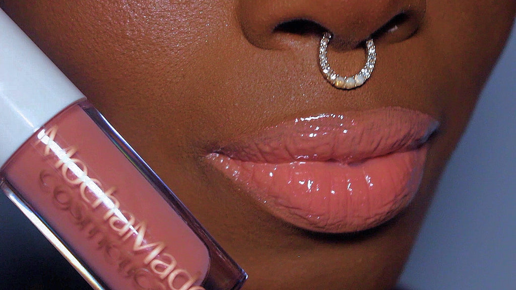  Pink me Nude is an opaque pinky nude gloss with a pinkish gold shimmer undertone Baby Girl  is a super high pink ethereal gloss with a pink purple holographic color shift that transfers as a gorgeous shimmery sheer light pink Part of our Fall Winter Color POPPIN Collection