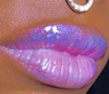 Grape Escape 2.0 is a glimmering, shimmering lavender blue that is designed to give your dark lip colors a glossy glitter shine super high shine lavender gloss with a blue violet sparkle color shift GLOSS BOMB HEAT UNIVERSAL LIP LUMINIZER fall lip topper fall lipgloss purple lip gloss bluish purple lips makeup purple lips aesthetic purple gloss purple glossy lips purple gloss aesthetic lip gloss glossy lips lip gloss collection lipstick color for dark skin