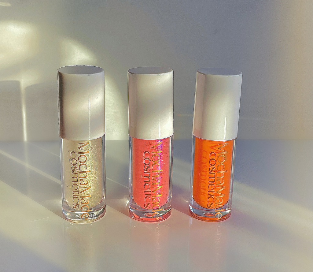 That Gworl super high shine clear gloss a golden yellow sparkle clear lip gloss for Fall Winter  mocha made cosmetics dior addict lip maximizer fenty glass slipper gloss bomb Peach Please super high shine bright orange gloss with a pink purple glitter color shift that transfers to gorgeous light shimmery peachy nude peach lips  butter gloss dior addict lip maximizer Baby Gworl pink ethereal pink purple shimmery sheer gloss baby shimmer pink lipgloss patrickta lipgloss haus labs  