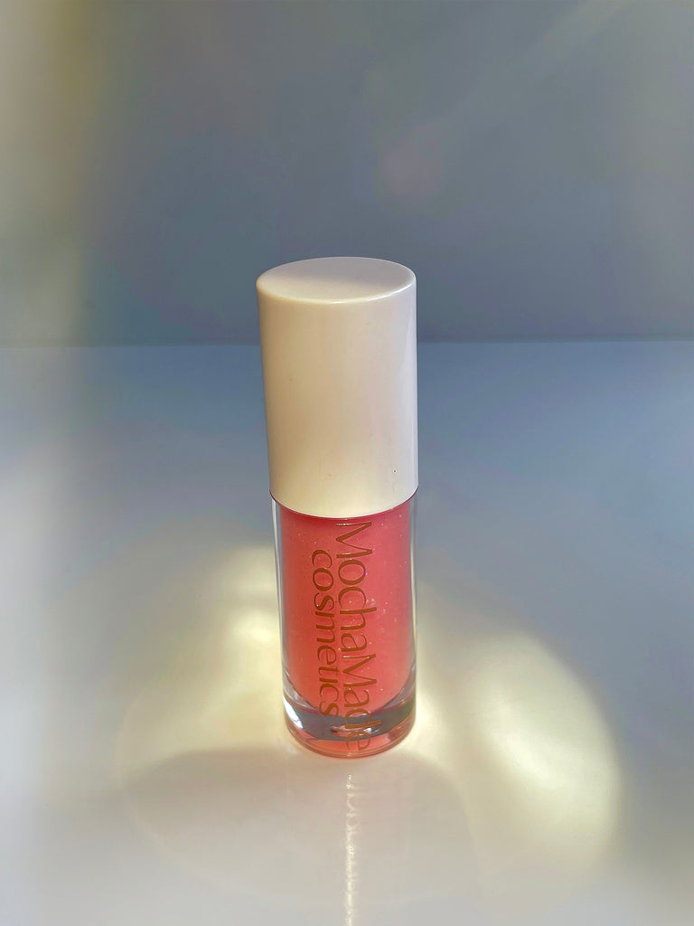  Pink me Nude is an opaque pinky nude gloss with a pinkish gold shimmer undertone Baby Girl  is a super high pink ethereal gloss with a pink purple holographic color shift that transfers as a gorgeous shimmery sheer light pink Part of our Fall Winter Color POPPIN Collection